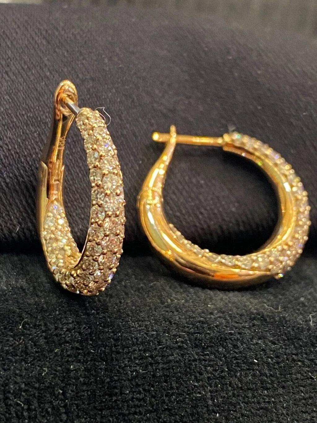 18-carat gold hoop earrings, set with brilliant-cut round “inside-out” diamonds weighing a total of 1.80 carats