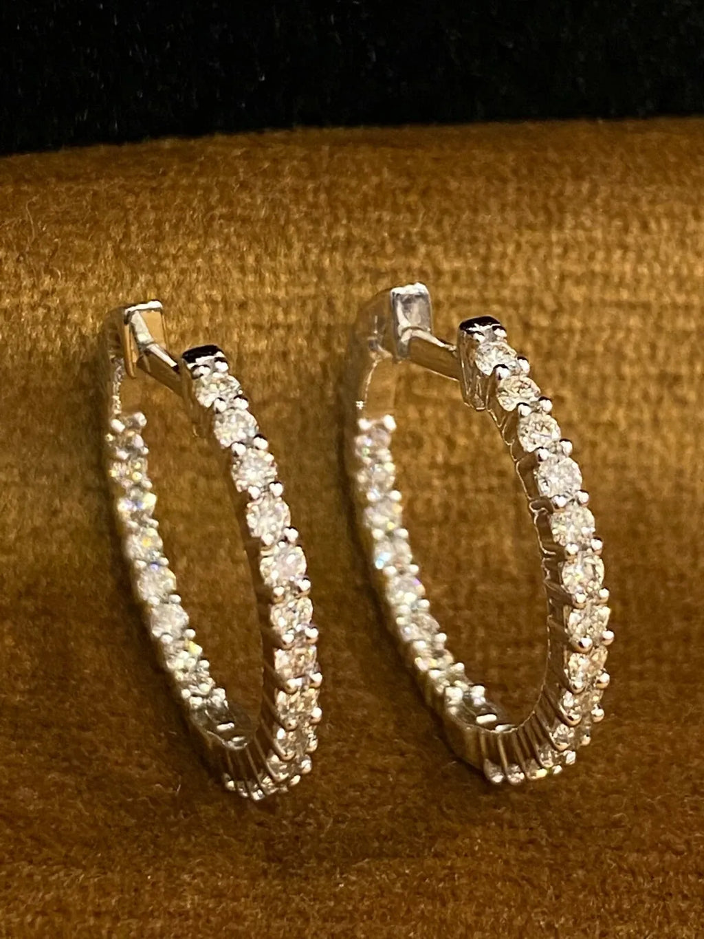 18K gold hoop earrings, set with 0.75 carats total weight of round brilliant-cut "inside-out" diamonds