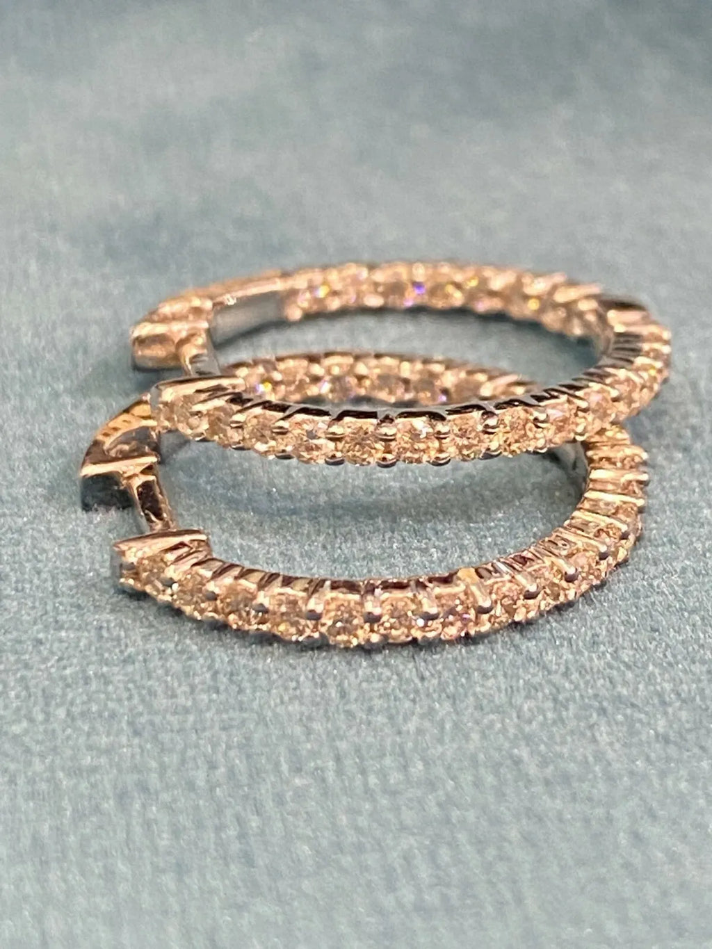 18K gold hoop earrings, set with 0.75 carats total weight of round brilliant-cut "inside-out" diamonds