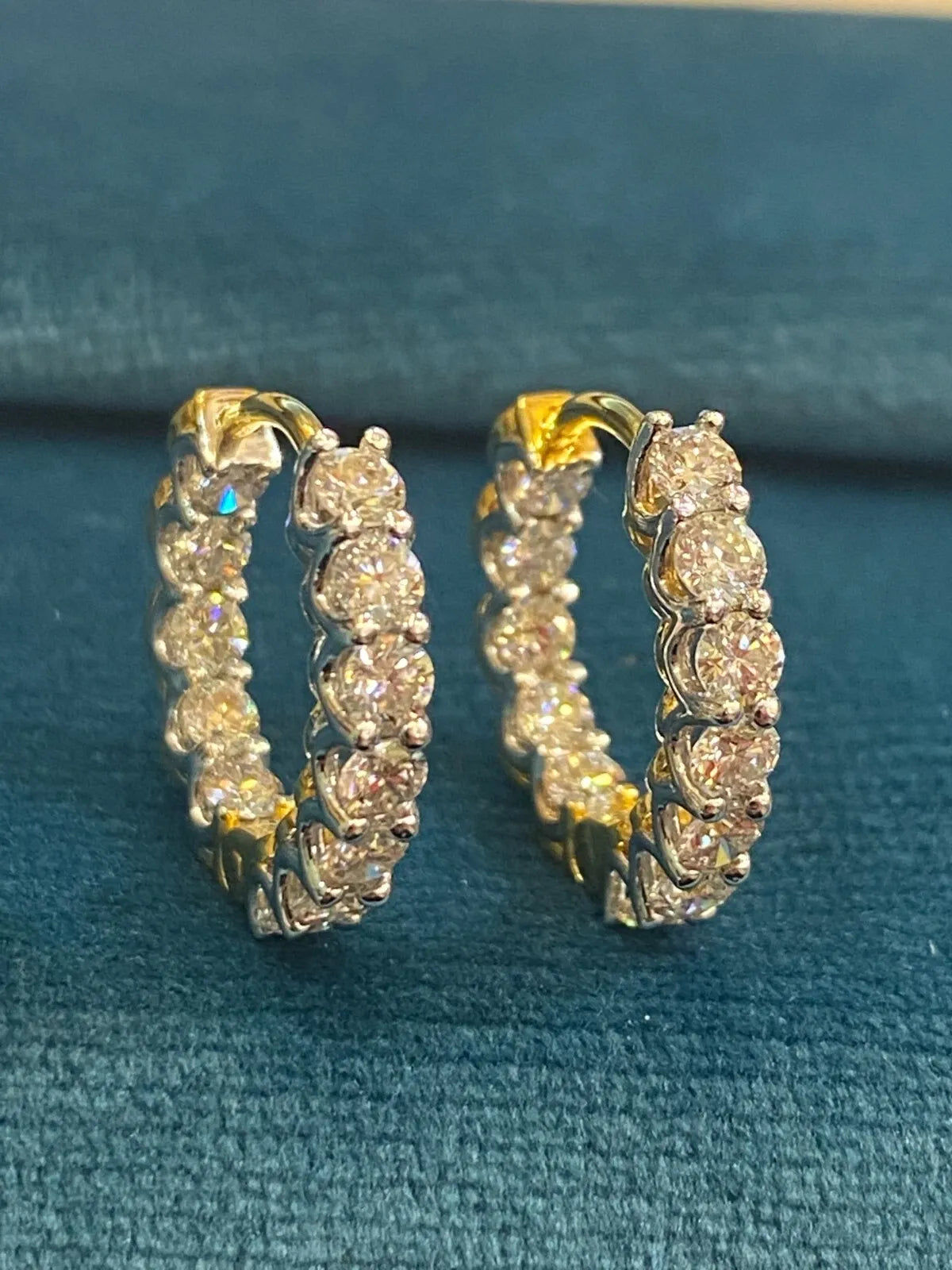 18K gold hoop earrings, set with 1.68 carats total weight of "inside-out" round brilliant-cut diamonds