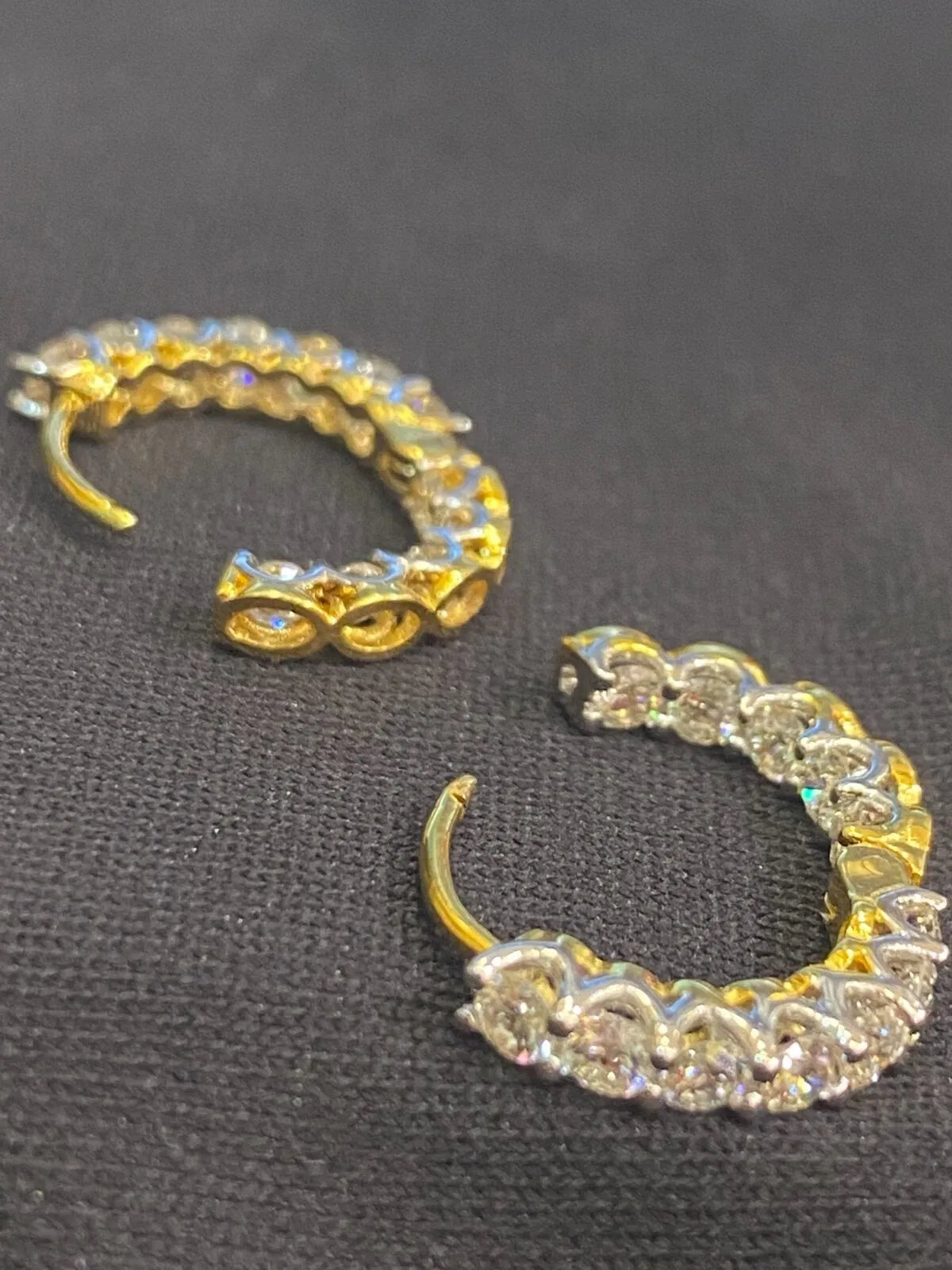 18K gold hoop earrings, set with 1.68 carats total weight of "inside-out" round brilliant-cut diamonds