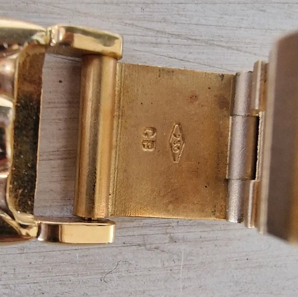 Ladies' Bucherer Medea yellow gold watch with diamond setting, 1997