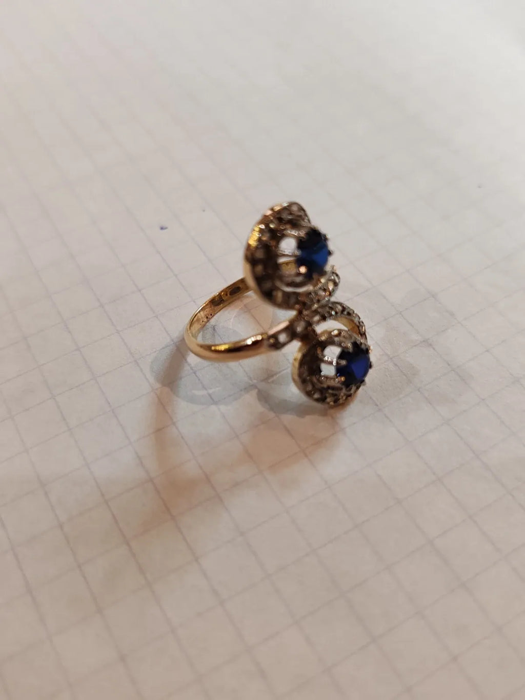 Antique 18K gold toi et moi ring with sapphires and old-cut diamonds