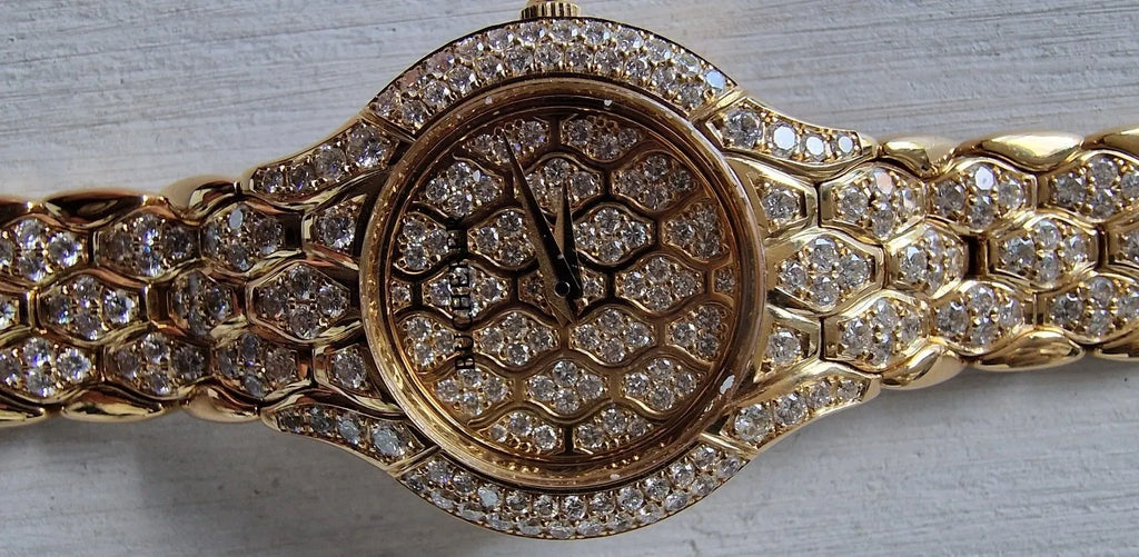 Ladies' Bucherer Medea yellow gold watch with diamond setting, 1997
