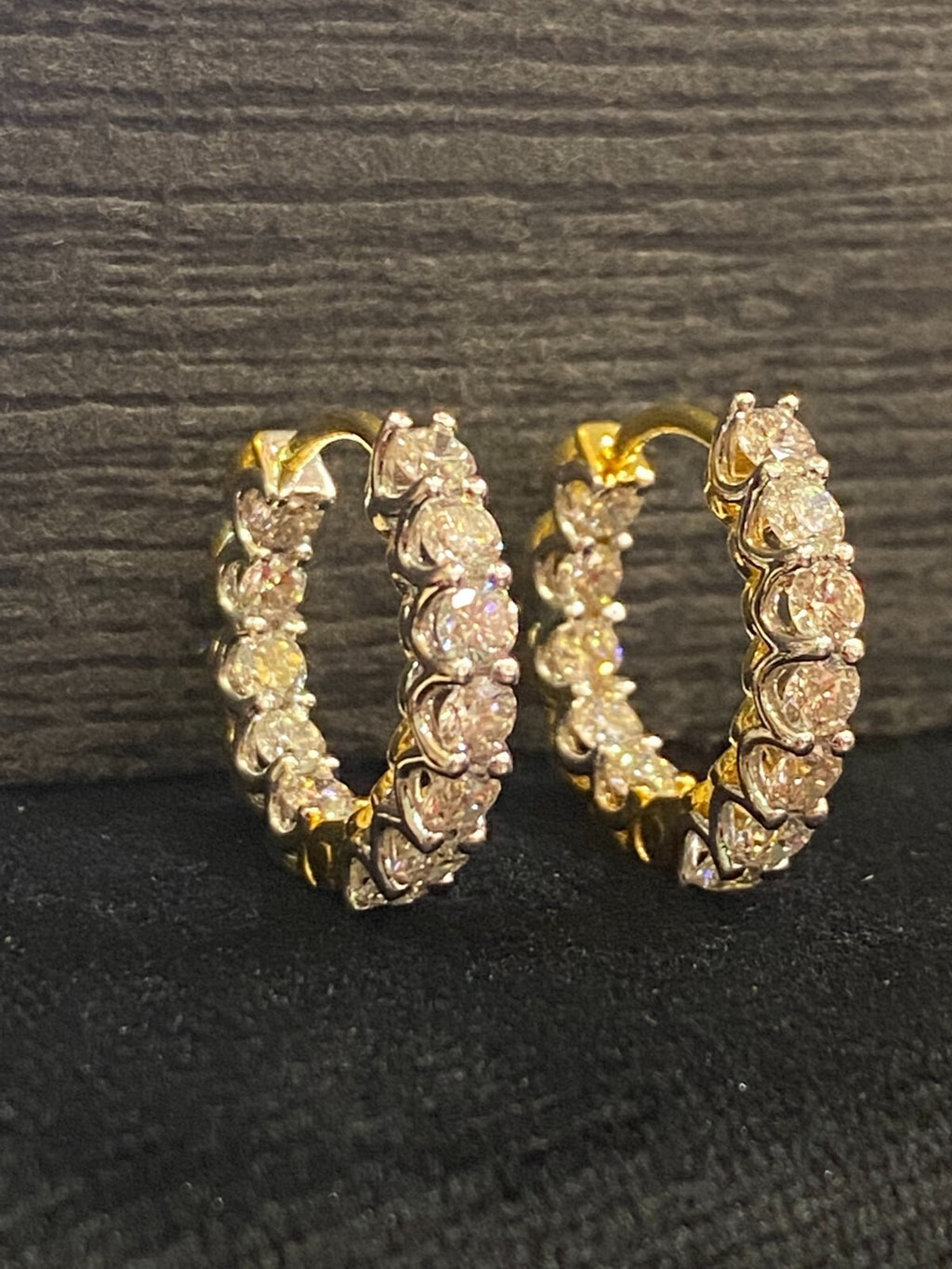 18K gold hoop earrings, set with 1.68 carats total weight of "inside-out" round brilliant-cut diamonds