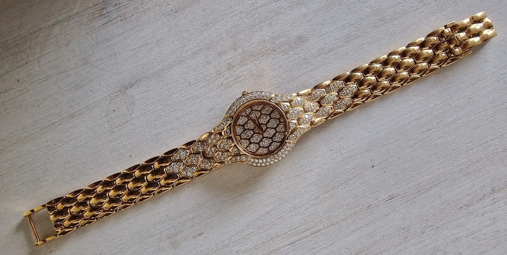 Ladies' Bucherer Medea yellow gold watch with diamond setting, 1997