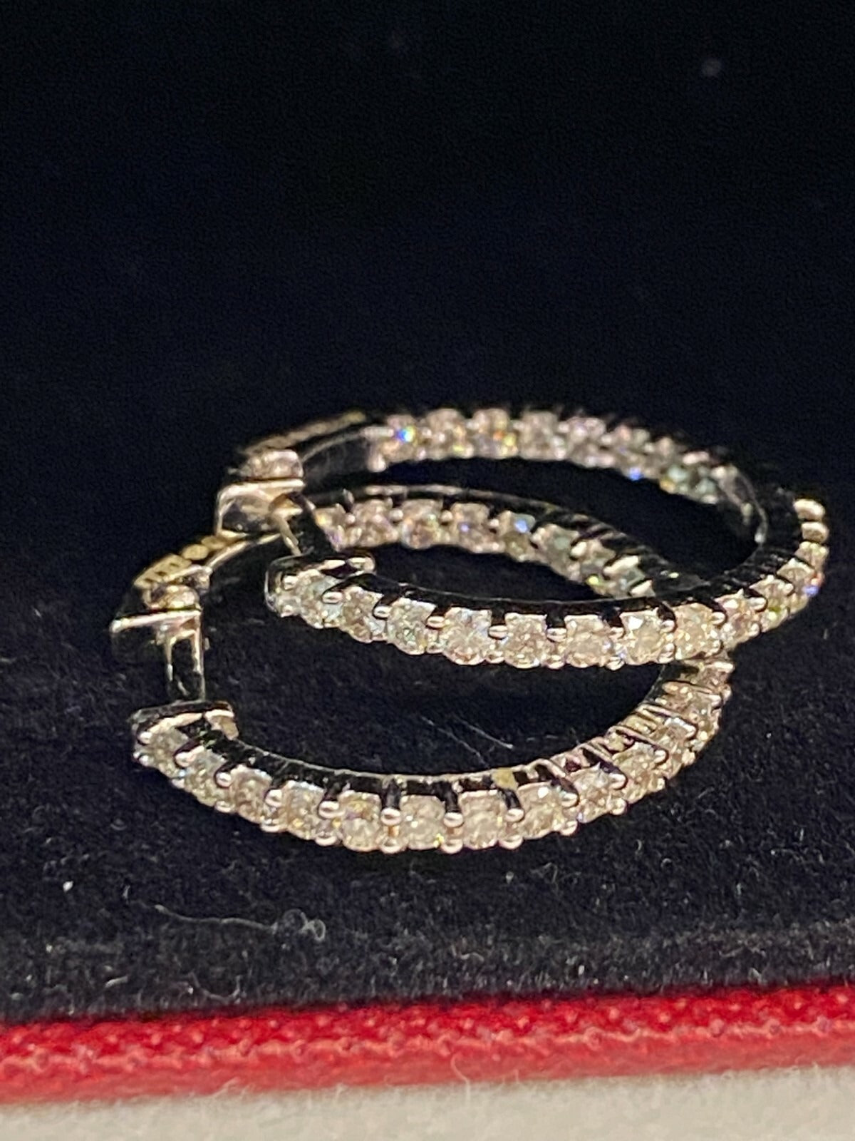 18K gold hoop earrings, set with 0.75 carats total weight of round brilliant-cut "inside-out" diamonds