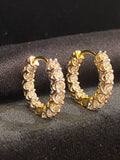 18K gold hoop earrings, set with 1.68 carats total weight of "inside-out" round brilliant-cut diamonds