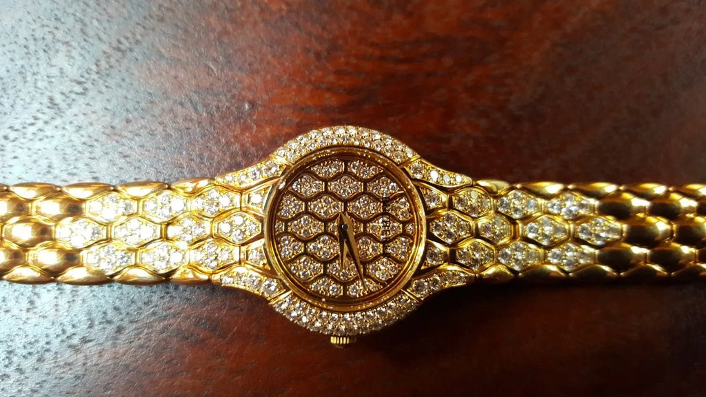 Ladies' Bucherer Medea yellow gold watch with diamond setting, 1997