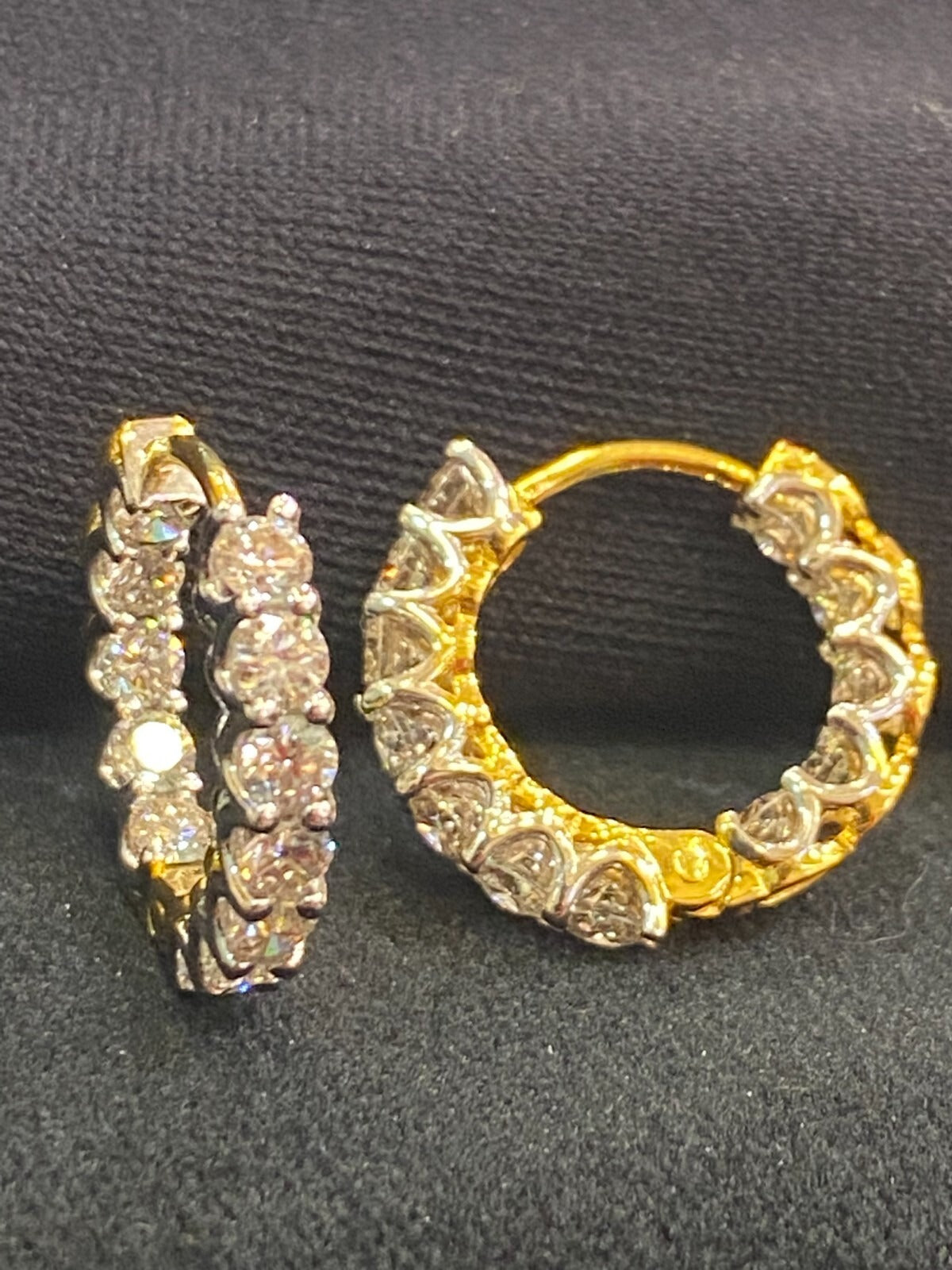 18K gold hoop earrings, set with 1.68 carats total weight of "inside-out" round brilliant-cut diamonds