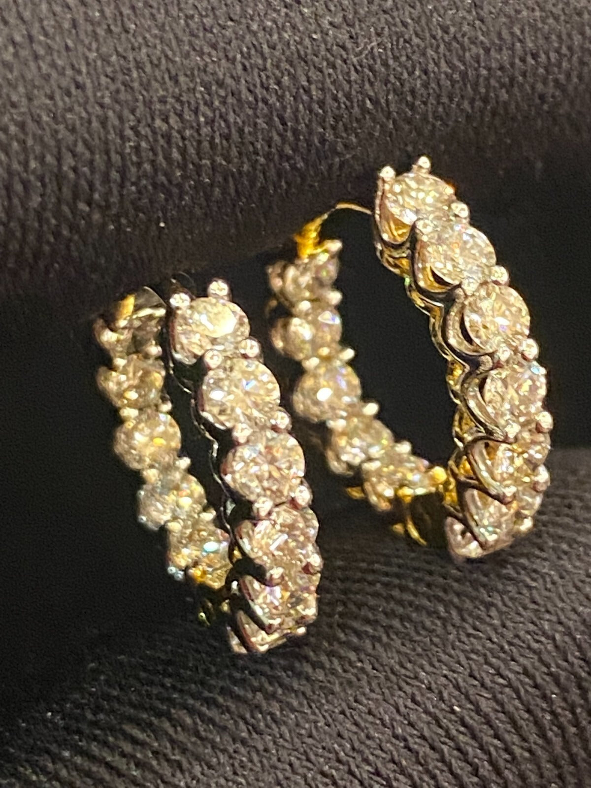 18K gold hoop earrings, set with 1.68 carats total weight of "inside-out" round brilliant-cut diamonds