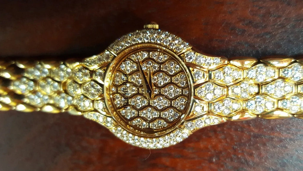 Ladies' Bucherer Medea yellow gold watch with diamond setting, 1997