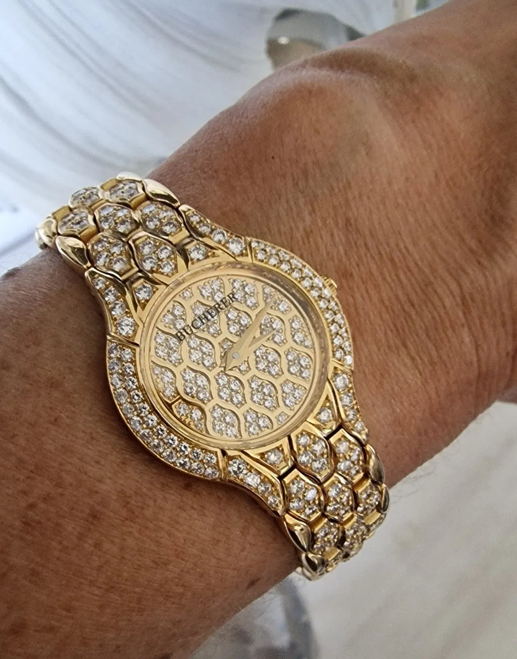 Ladies' Bucherer Medea yellow gold watch with diamond setting, 1997