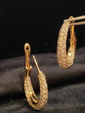 18-carat gold hoop earrings, set with brilliant-cut round “inside-out” diamonds weighing a total of 1.80 carats