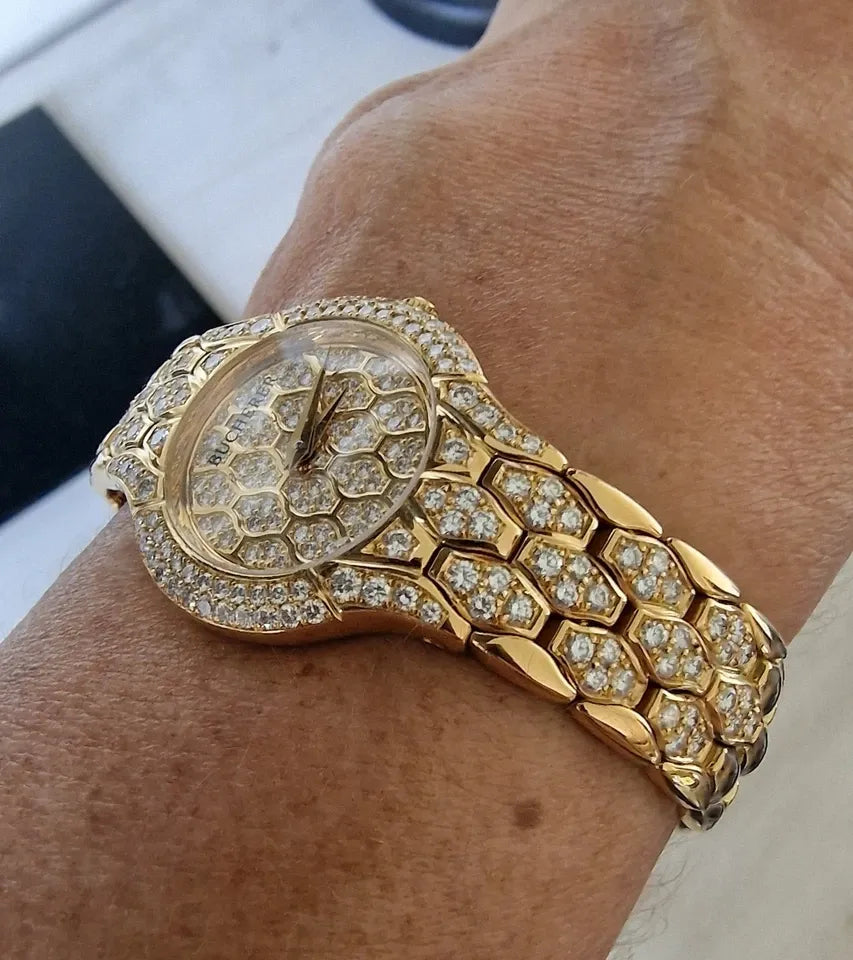 Ladies' Bucherer Medea yellow gold watch with diamond setting, 1997