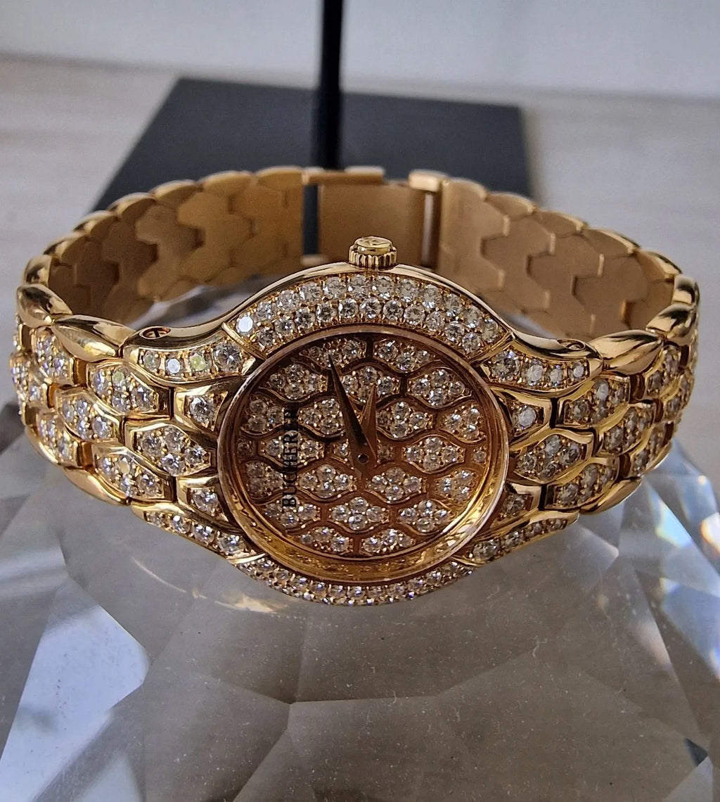Ladies' Bucherer Medea yellow gold watch with diamond setting, 1997