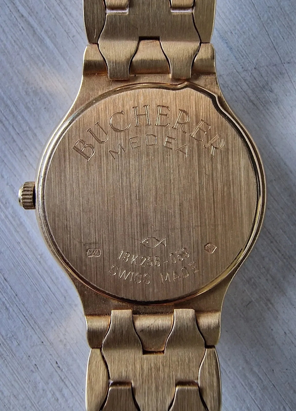 Ladies' Bucherer Medea yellow gold watch with diamond setting, 1997