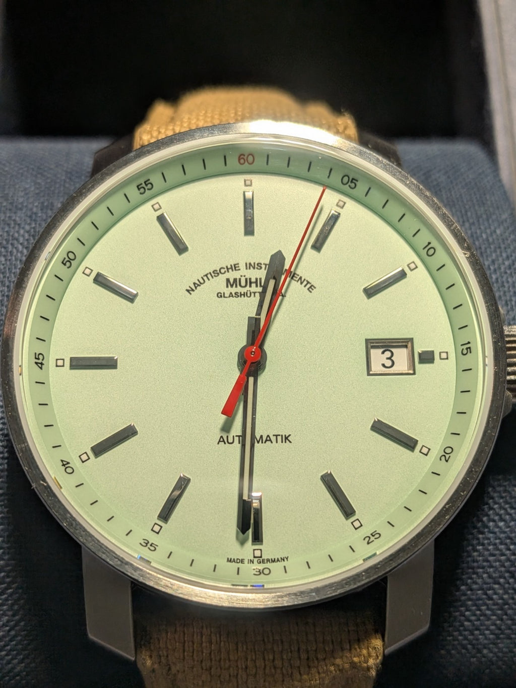 Mühle Glashütte 29ER, new condition, with sand-colored textile strap_M1-25-29-CB