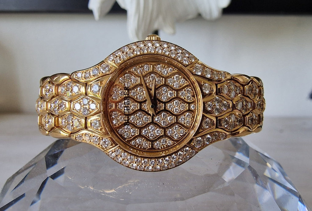 Ladies' Bucherer Medea yellow gold watch with diamond setting, 1997