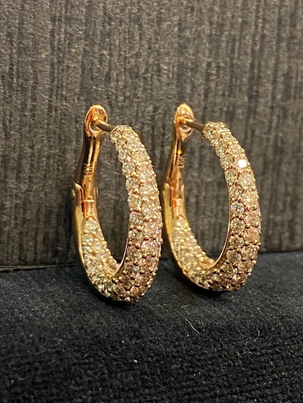 18-carat gold hoop earrings, set with brilliant-cut round “inside-out” diamonds weighing a total of 1.80 carats