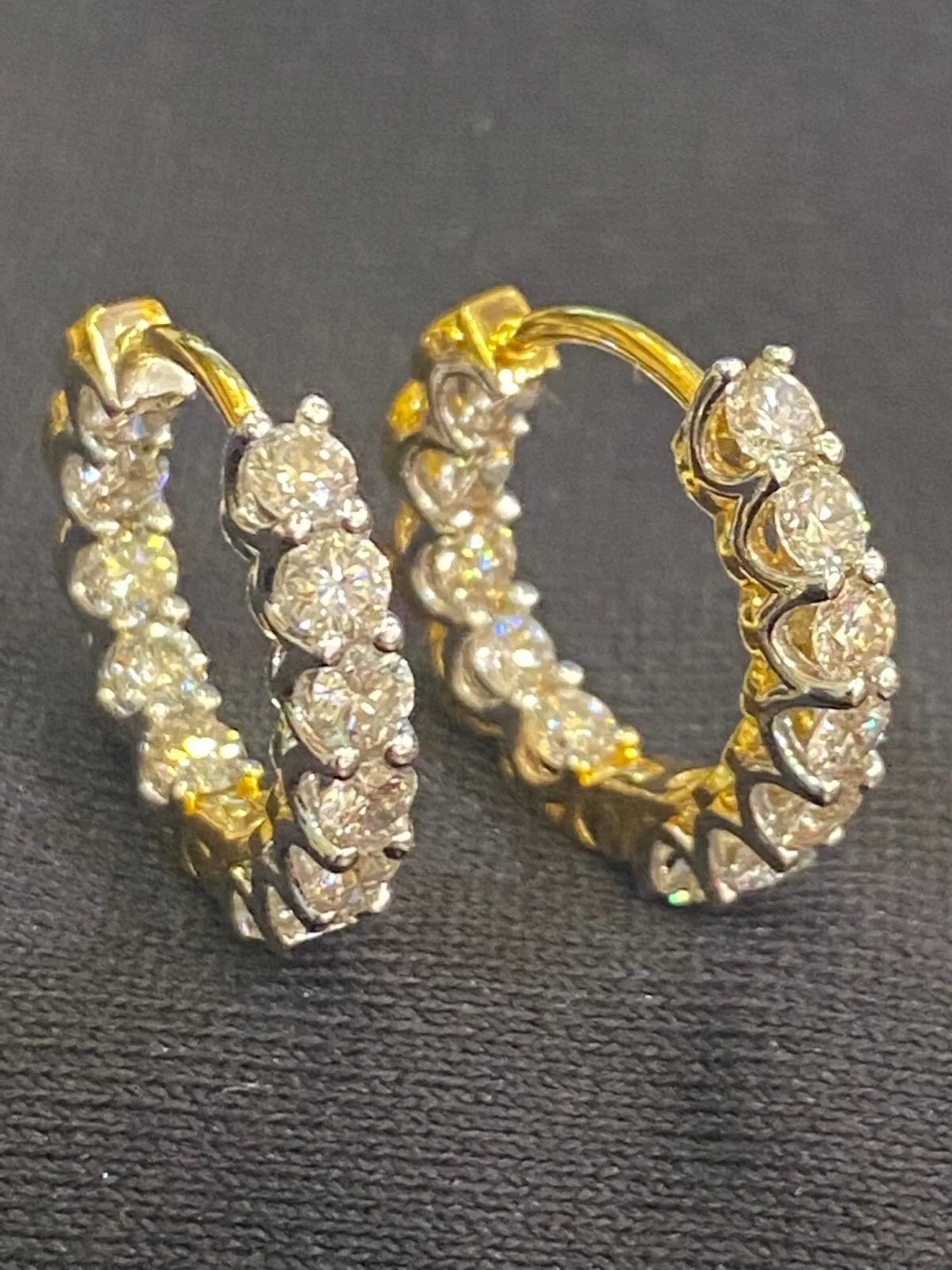 18K gold hoop earrings, set with 1.68 carats total weight of "inside-out" round brilliant-cut diamonds